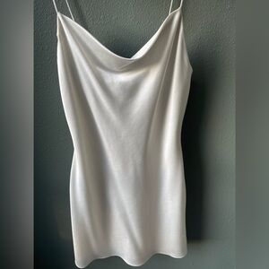 Elegant White Women's spaghetti strap mini cocktail dress.